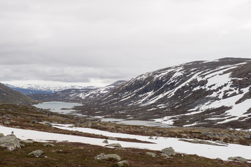 Melting lake in the Hellesylt Valley in Norway, panoramic view