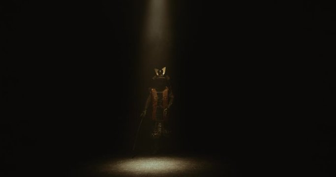 Asian man in traditional samurai costume stepping into the light with his sword prepared in hands, isolated on black background - culture, tradition concept 4k footage