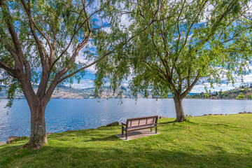 A bench with gorgeous view at mountain lake, British Columbia, Canada.