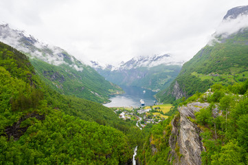 Geiranger / Norway 06.29.2015Panoramic view of Geiranger Fjord on cloudy day