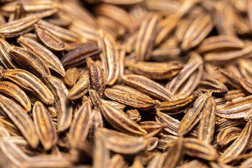 Background texture of caraway seeds.