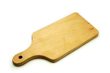 Wooden kitchen utensils on white background. Handcrafted cutting board.