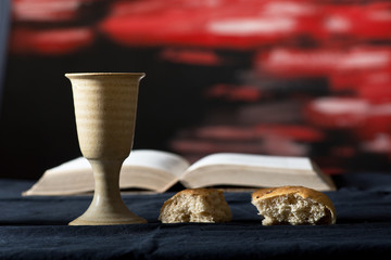 Still life with chalice of wine and bread