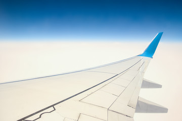 Fototapeta premium earth and clouds with an airplane on nature in the sky background