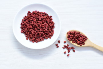 Achiote seed called Bixa orellana of America, used to flavor food