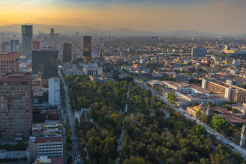 Panorama of Mexico city central part  from skyscraper Latino americano. View with buildings. Travel photo, background, wallpaper. Toned photo.