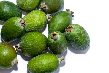 Juicy ripe delicious green feijoa fruit. On a white background