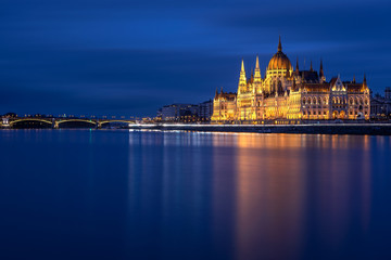Hungarian Parliament Building in Budapest at night with Danube river