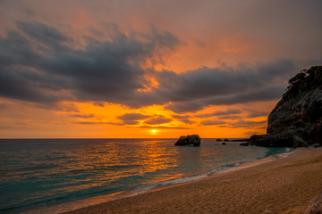 Colorful Sea Sunrise on a Small Beach