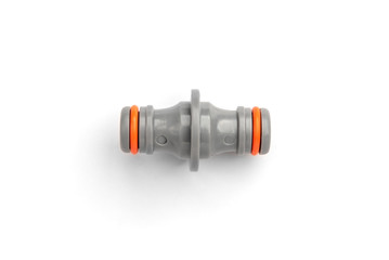 Gray garden water hose connector isolated on white background.