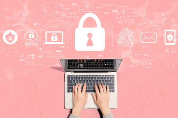 Internet network security concept with person using a laptop computer