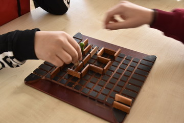a board game and playing hand