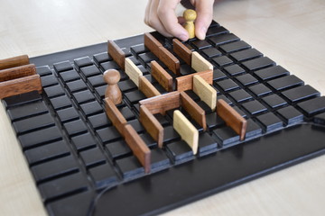 a board game and playing hand