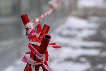 protective striped tape on stands from the descent of snow and crash