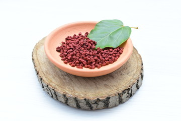 Achiote seed called Bixa orellana of America, used to flavor food