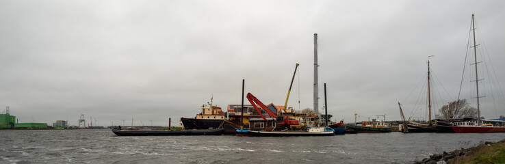 Old and new in port at the North Sea Canal