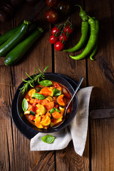 zucchini vegetarian ratatouille with tomato sauce and herbs