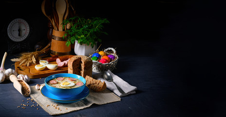 Fototapeta na wymiar Easter in Polish: sour flour soup for Easter breakfast (Żurek)
