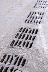 Metal grills city storm sewers