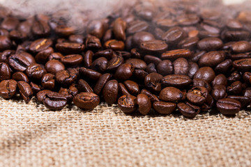 coffee beans on burlap background