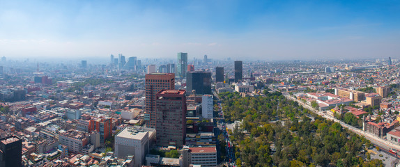 Fototapeta na wymiar Historic center of Mexico City with CBD skyline on Avenue Paseo de la Reforma aerial view from Torre Latinoamericana, Mexico City CDMX, Mexico. Historic center of Mexico City is a World Heritage Site.