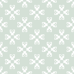 Fototapeta na wymiar Retro vintage style vector seamless pattern. Delicate abstract geometric texture with crosses, floral shapes, repeat tiles. Elegant ornamental background in soft green and white colors. Simple design
