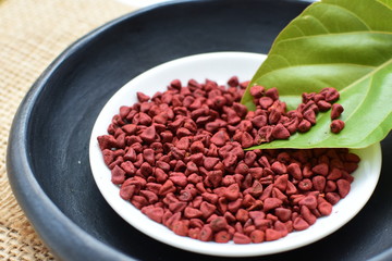 Achiote seed called Bixa orellana of America, used to flavor food