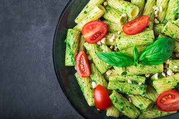 Homemade tortiglioni pasta with vegan pesto sauce