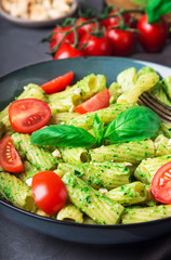 Homemade tortiglioni pasta with vegan pesto sauce