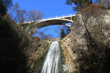 Bridge over waterfall