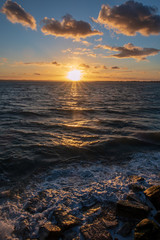 The sun sets over the sea at Southsea