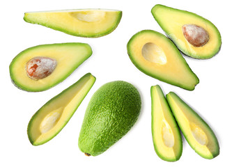 Set of delicious fresh avocados on white background, top view