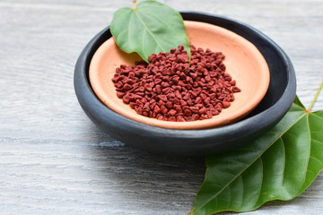 Achiote seed called Bixa orellana of America, used to flavor food