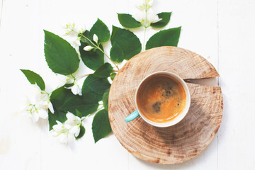 coffee with mint leaves on wooden background with copy space for your text. morning concept