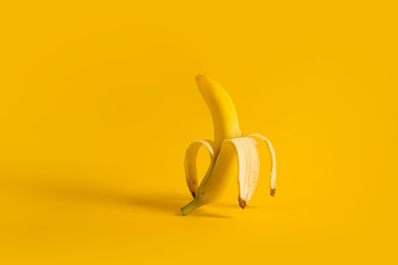 Banana in a banana on a yellow background. Creative concept