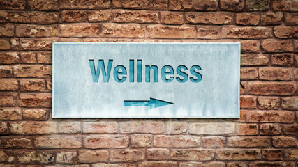 Naklejka premium Street Sign to Wellness