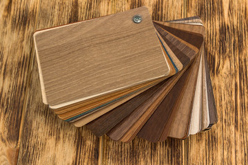 Obraz na płótnie Canvas wooden color swatch choosing wood material for housing project. Architecture and construction.