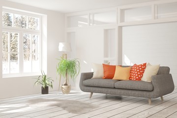 Stylish room in white color with sofa and winter landscape in window. Scandinavian interior design. 3D illustration