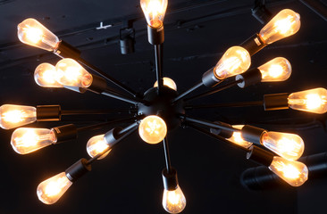 Lots of light bulbs on a dark background.