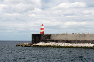 Portugal, Ponta Delgada, Azores. Old beautiful lighthouse. The island of San Miguel.