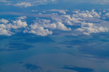 Sunny aerial sky landscape from and airplane window seat