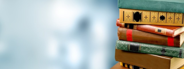 Stack of old colored study books