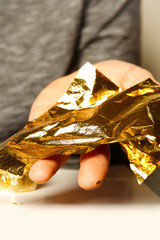 Artwork of gilding - covering an object with plate metal gold