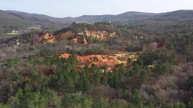 Canyon geological red ochres aerial shot pine tree forest aerial shot Colorado Provencal France 