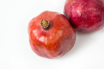 Red Garnet fruit on white. Isolated object for design layouts