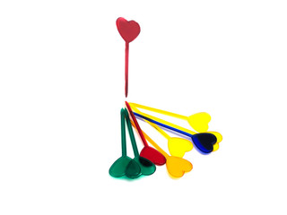 Skewers isolated on a white background. A composition of skewers for food. Skewers in the form of a heart. Food and Valentine's Day.