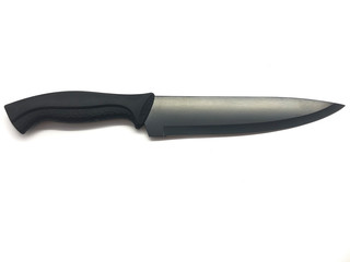 Utility knife isolated on a white background. Black sharp knife. Paring knife. Carving knife. 