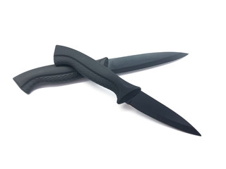 Knife composition isolated on a white background. Set of black matte knives. Paring knife and utility knife. Sharp blade.