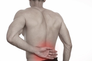 Man with back pain. Muscle spasm .Sport exercising injury