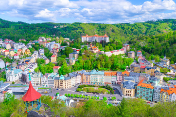 Karlovy Vary (Carlsbad) historical city centre top aerial view with colorful beautiful buildings,...